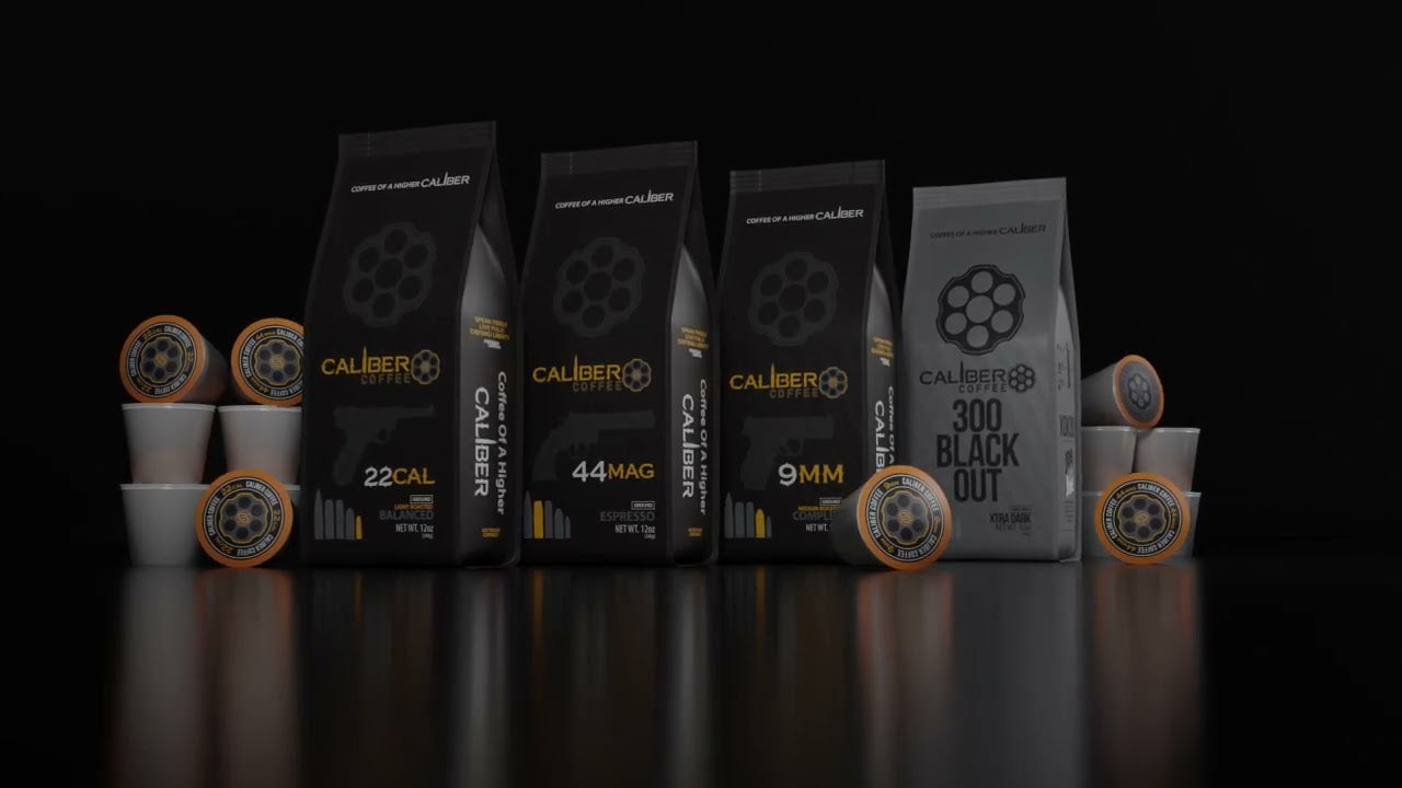 Four bags of coffee labeled with calibers—.22 Cal, .44 Mag, 9mm, and 300 Blackout—are displayed with coffee pods, all against a black background. The packaging features a revolver cylinder motif.