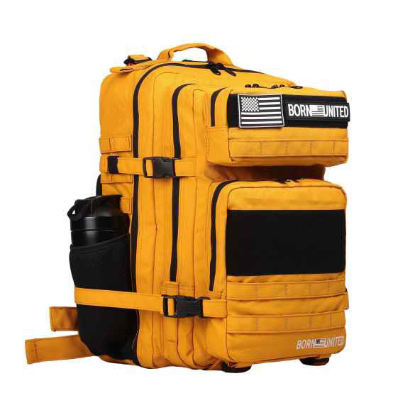 The Gold Glory Premium Tac-Pac - 45L by Born United Private Label is a yellow tactical backpack with gold accents, black highlights, and an Born United American flag patch. It features multiple compartments and a side pocket for a sleek black water bottle.