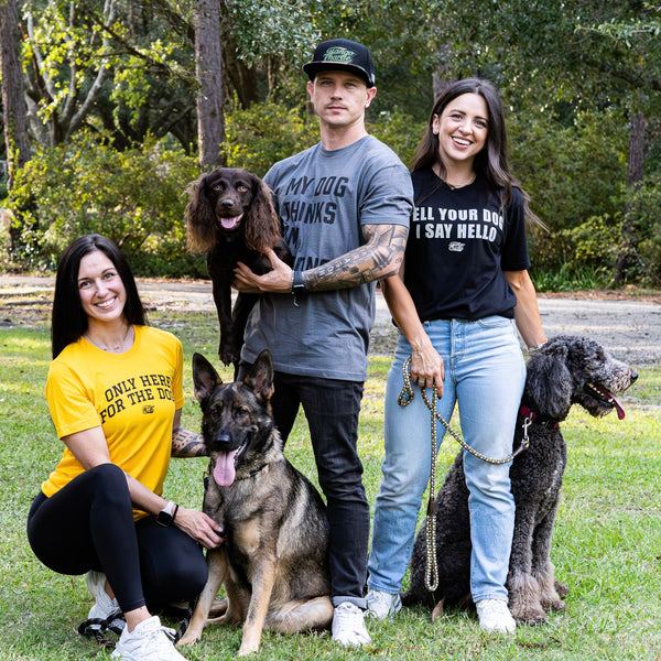 tango charlie - unisex my dog thinks i'm strong t-shirt on model