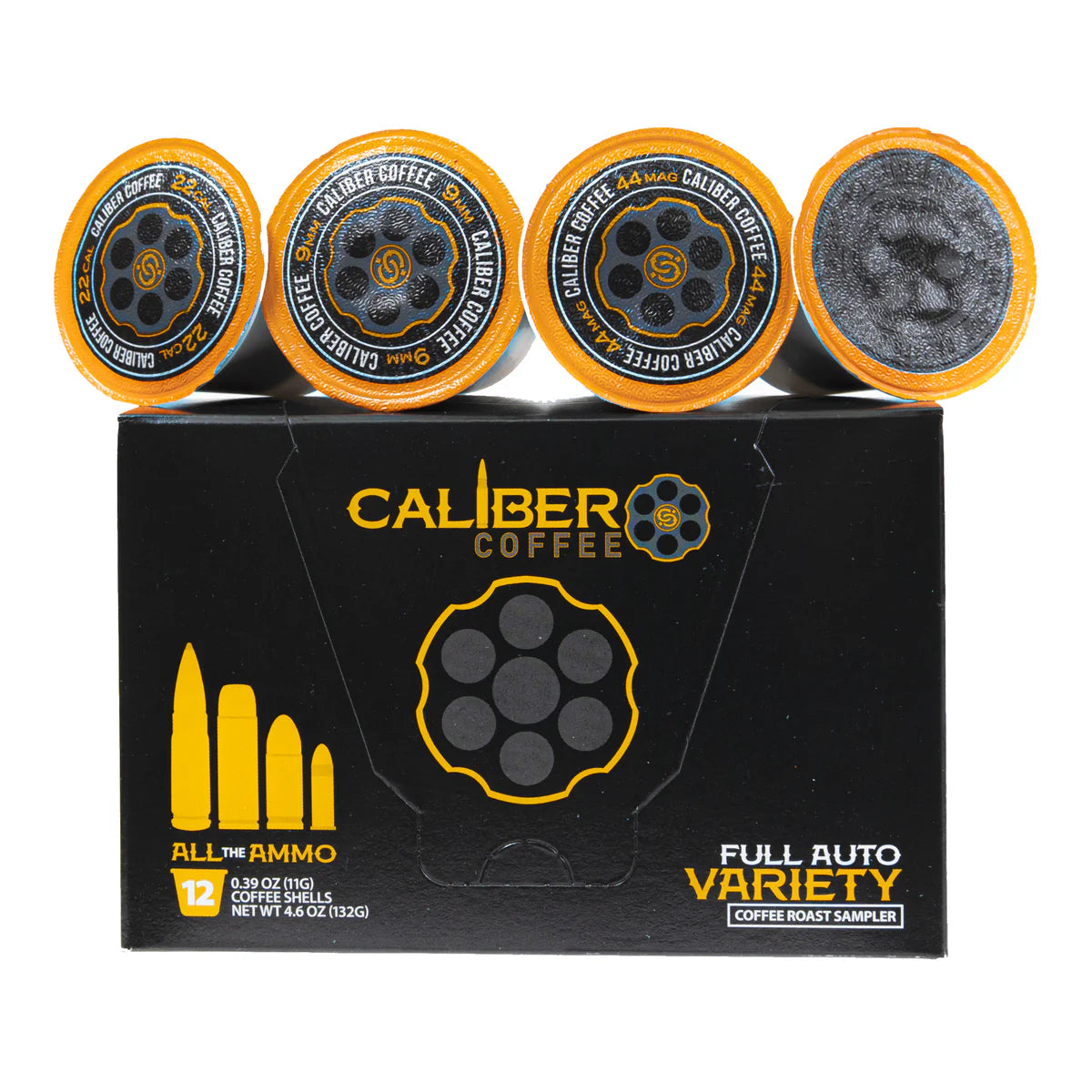 A box of Caliber Coffee Companys All The Ammo Variety 12 Count Single-Serve Shell, designed like ammunition, features bullet graphics and displays four Espresso Roast coffee pods on top. The box contains 12 pods and weighs 4.4 oz.