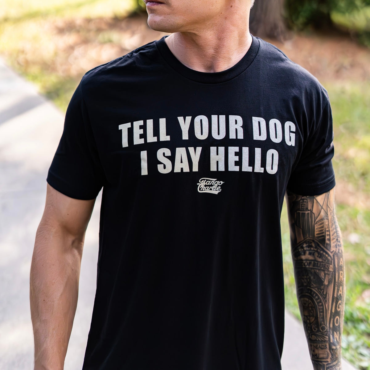 tango charlie - tell your dog i say hello tee on male model