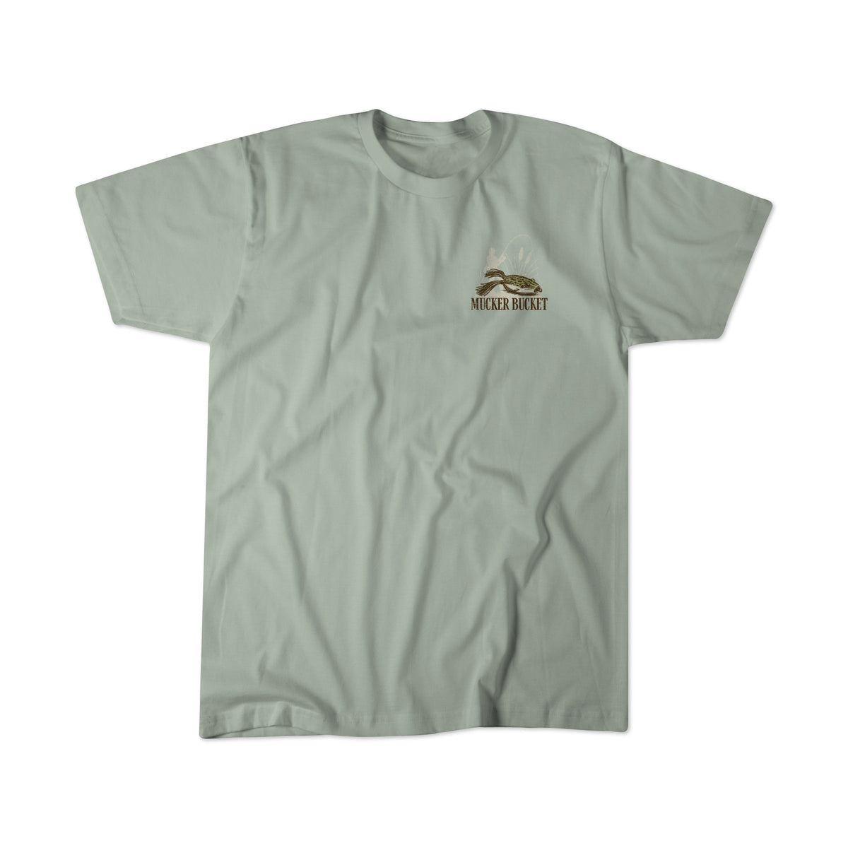 The Bait DNA Premium Tee by Mucker Bucket is a light gray, premium relaxed fit t-shirt featuring a small Mucker Bucket logo and mountain graphic on the left chest. Made from soft ring-spun cotton, this tee is shown laid flat with visible fabric creases, emphasizing its comfortable quality.