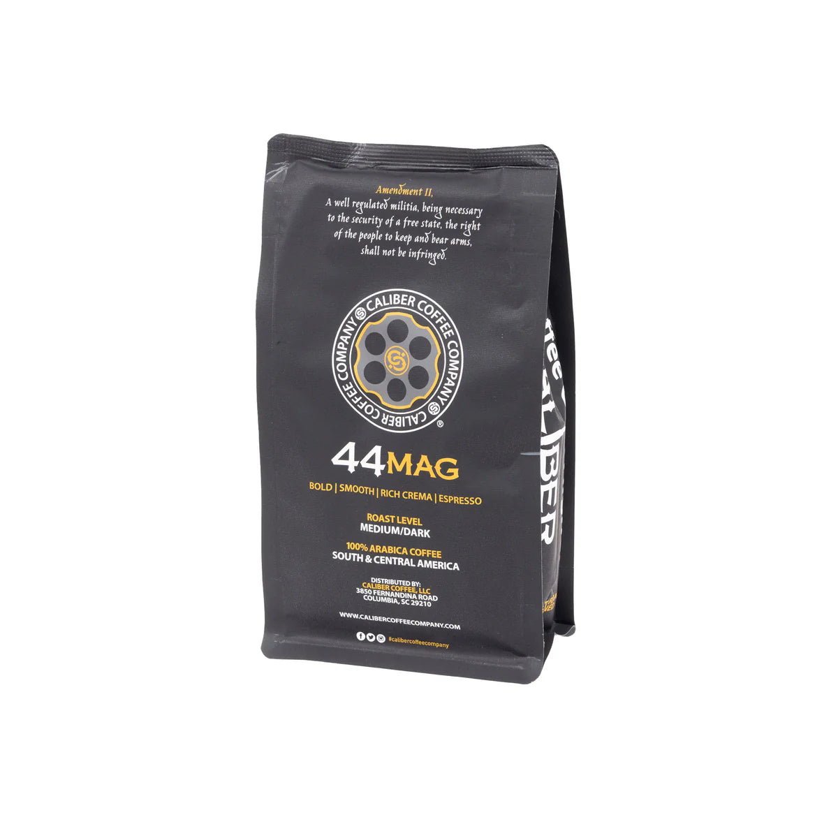 A black bag of Caliber Coffee Companys Caliber Espresso Roast .44 Mag whole bean coffee spotlights its artisan-roasted, specialty-grade blend. The packaging details the roast level, flavor profile, and origin—a crafted blend from Central and South America using 100% Arabica beans.