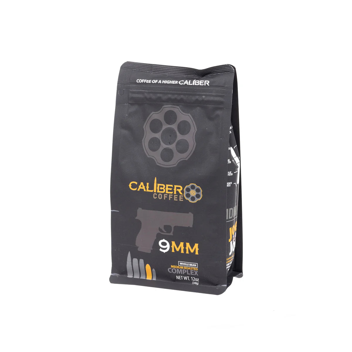 The Caliber Coffee Companys black bag of whole bean features 9 MM in orange, a gun cylinder and bullets design, with the tagline Coffee of a Higher Caliber. It highlights Colombian Single Origin Specialty Grade Coffee. Net weight is 12 oz.