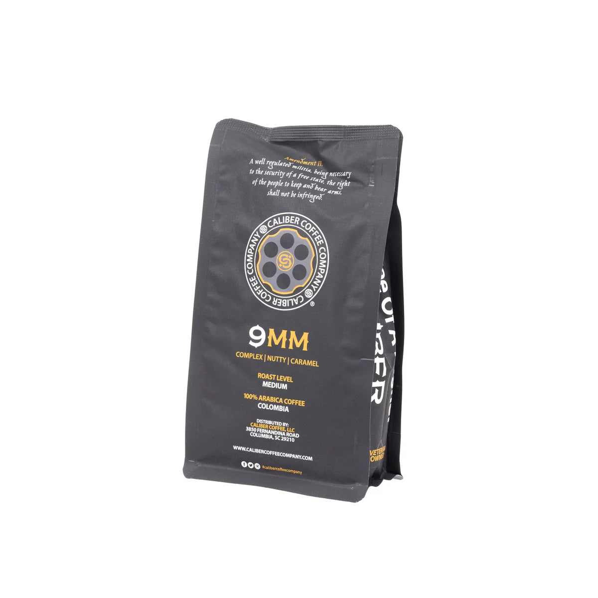 Caliber Coffee Companys Caliber Medium Roast 9MM Whole Bean features a black bag with a circular bullet logo, details in white and orange text, and is described as complex, nutty, and caramel.