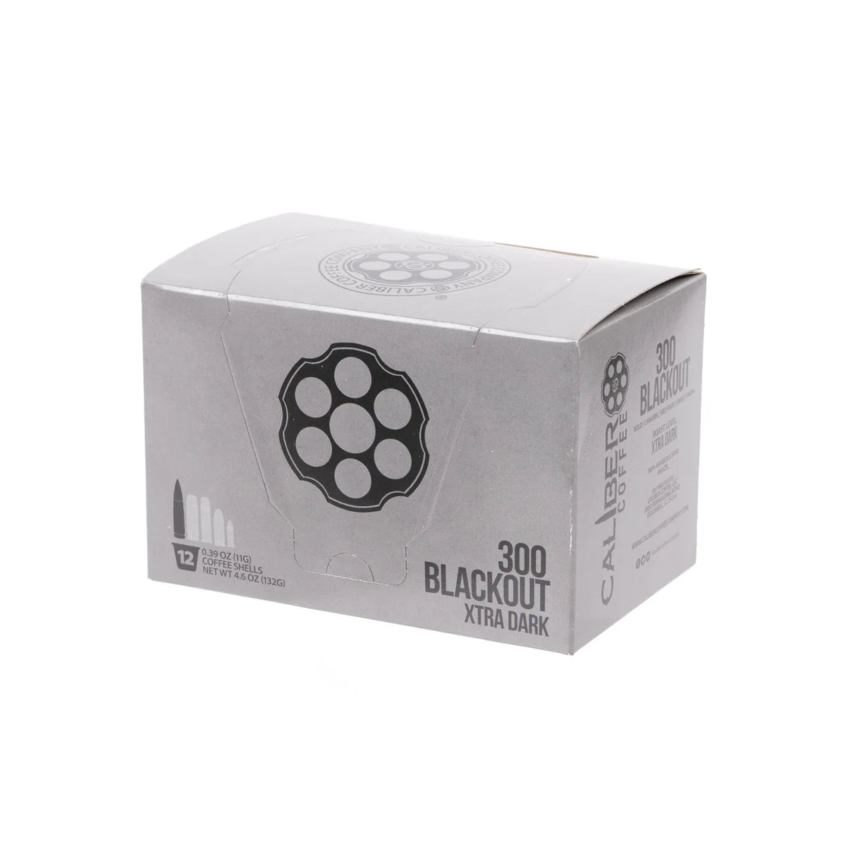 A silver box labeled Dark Roast 300 Blackout Single-Serve Shells by Caliber Coffee Company, featuring bullet and revolver cylinder illustrations. Contains 12 servings of specialty dark roast coffee, totaling 4.9 ounces (139.2 grams).