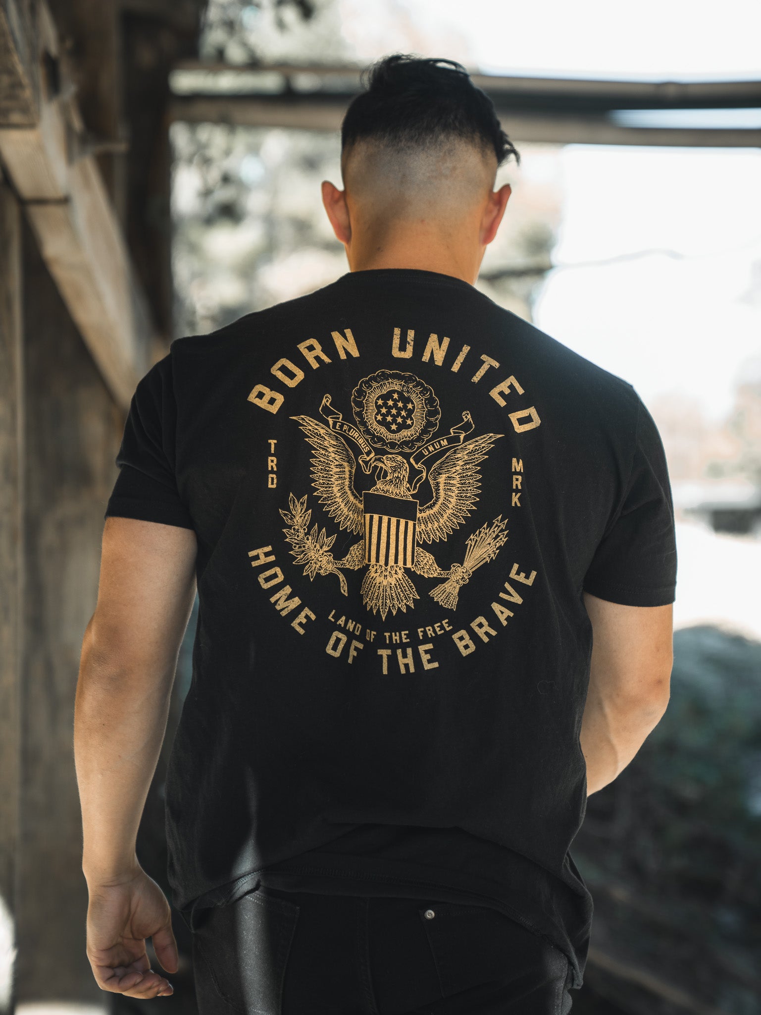 born united - unisex e pluribus unum t-shirt on model