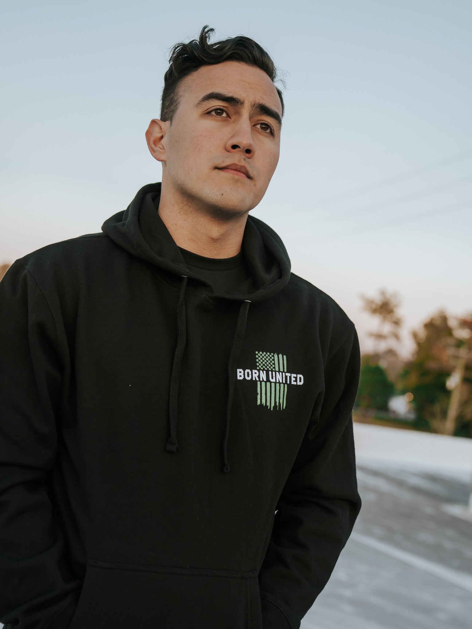 born united - american heroes hoodie front on model