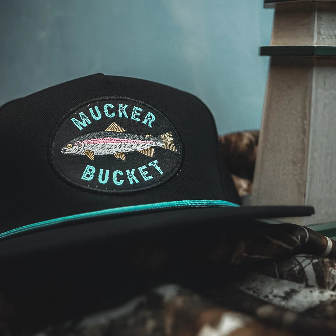 mucker bucket - rainbow trout bucket hat flat lay