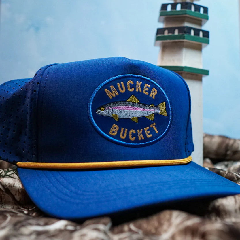 mucker bucket - rainbow trout blue bucket flat lay