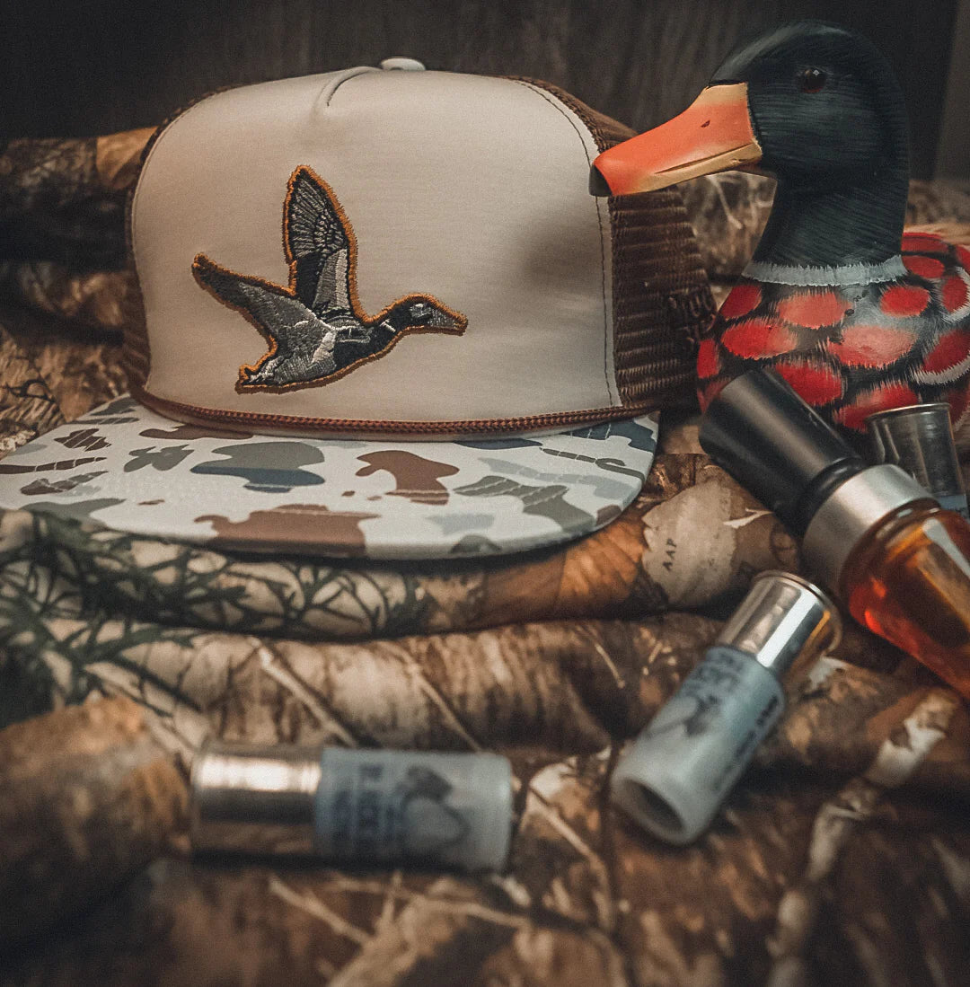 mucker bucket - camo duck bucket hat flat lay
