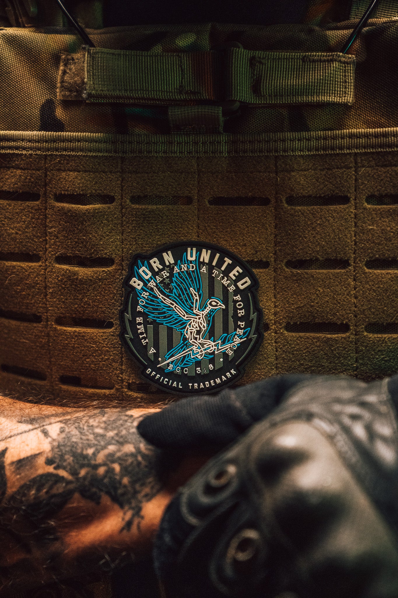 born united - war and peace pvc patch on model
