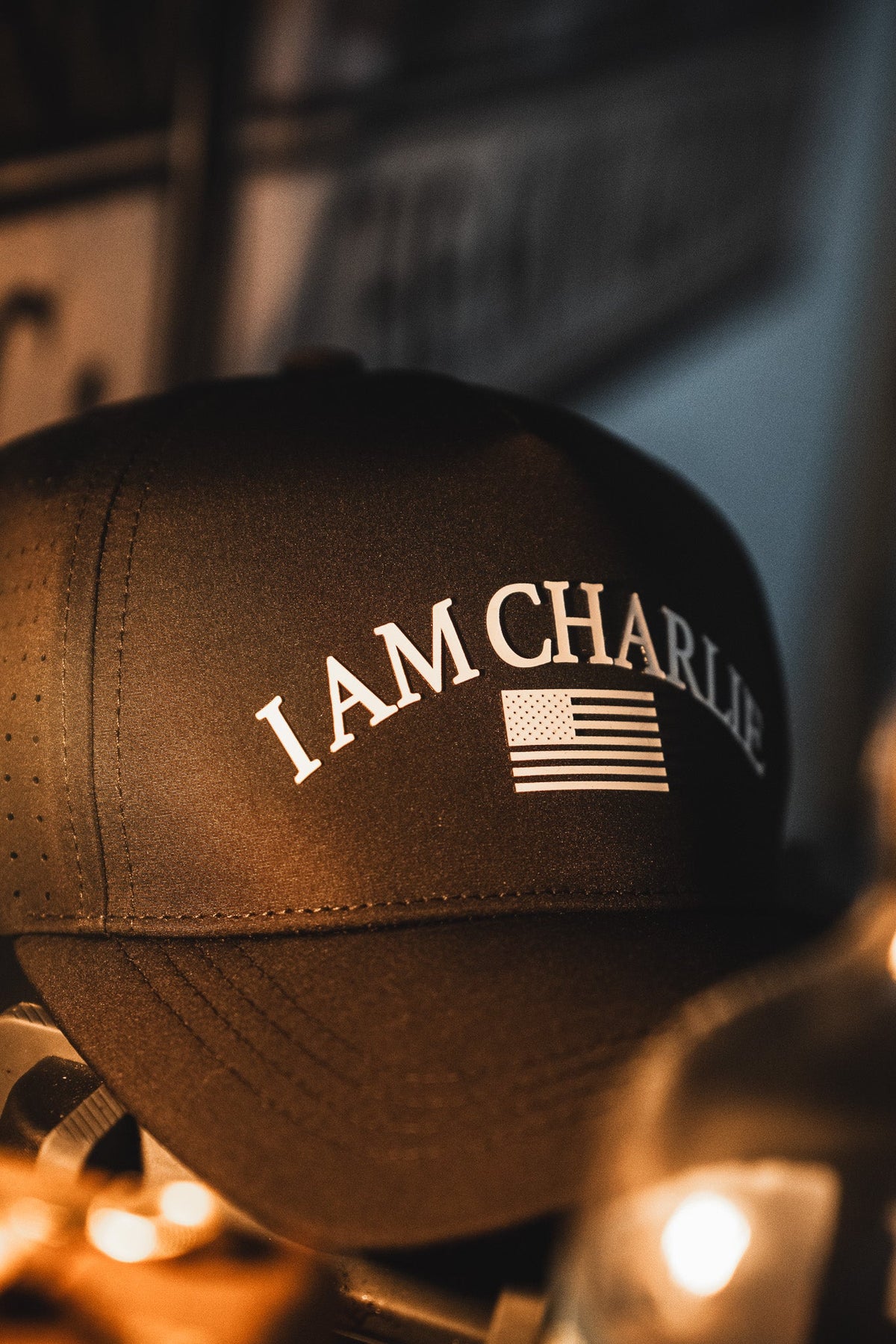 The I Am Charlie Black Snapback by Born United Private Label features "I AM CHARLIE" and an American flag on the front—a stylish choice for fans of handmade hats.