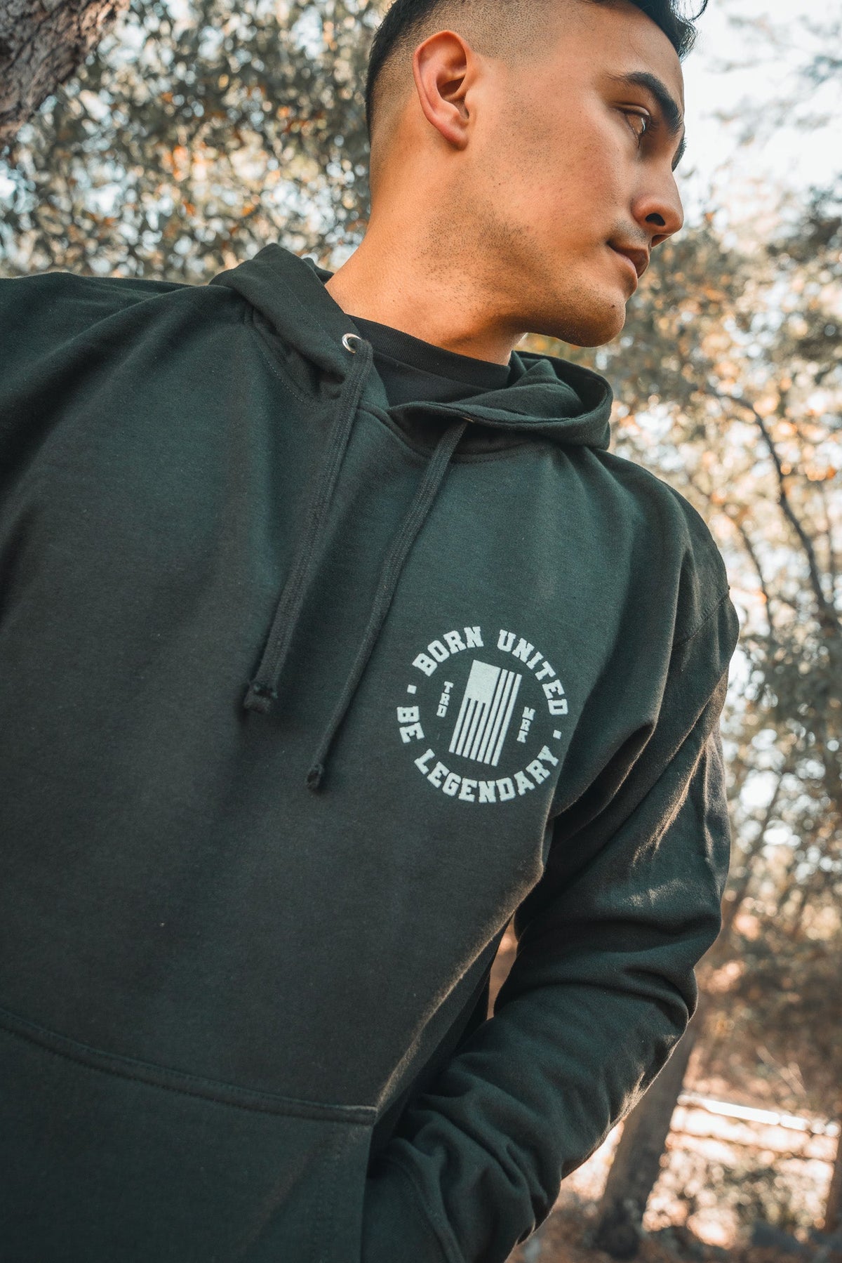 born united - unisex forever legend black trump hoodie on male model