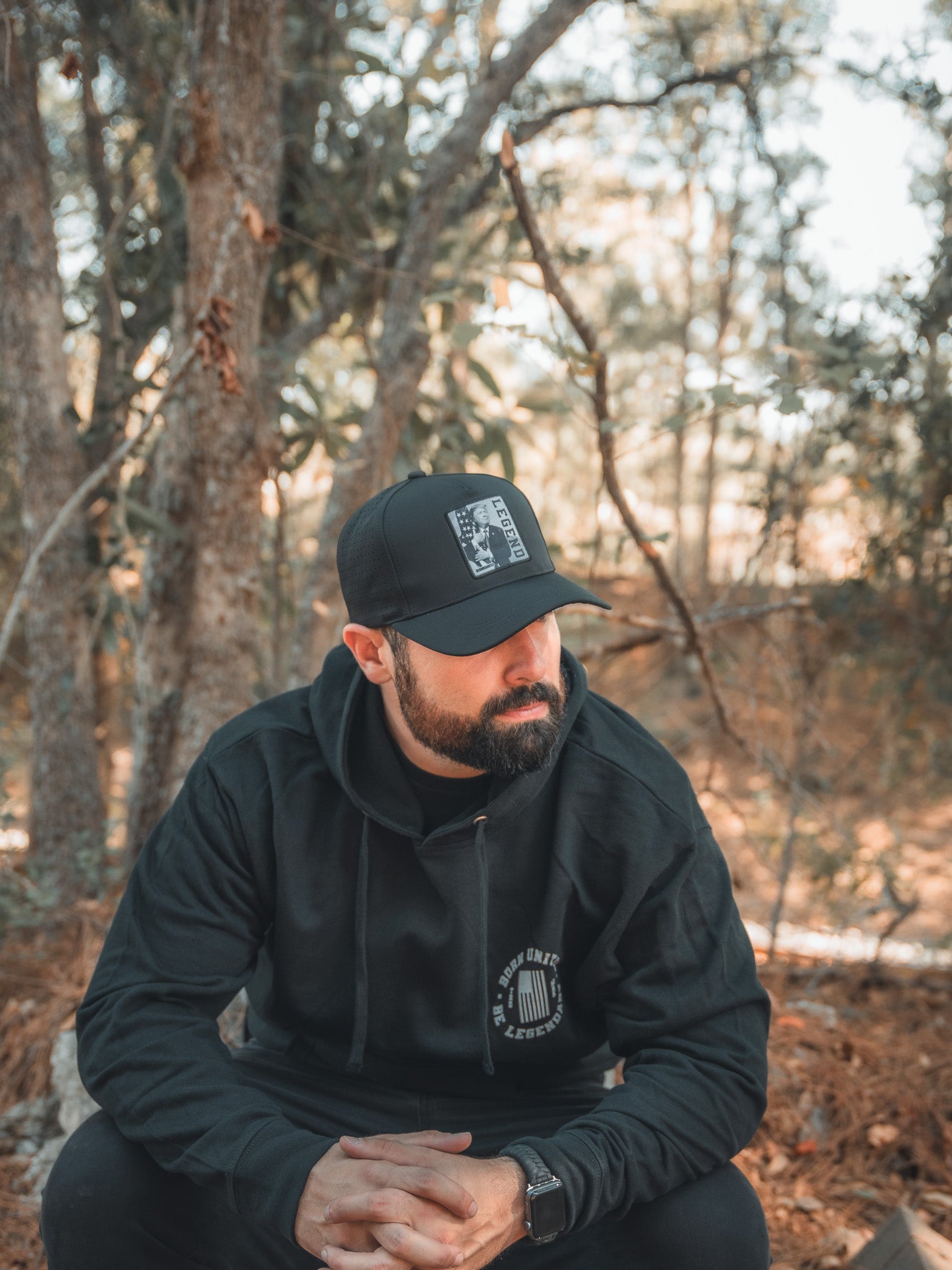 born united - legend trump hat on model