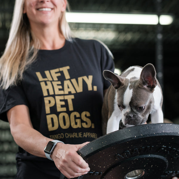 tango charlie - lift heavy pet dogs gold edition tee shirt on frmale model