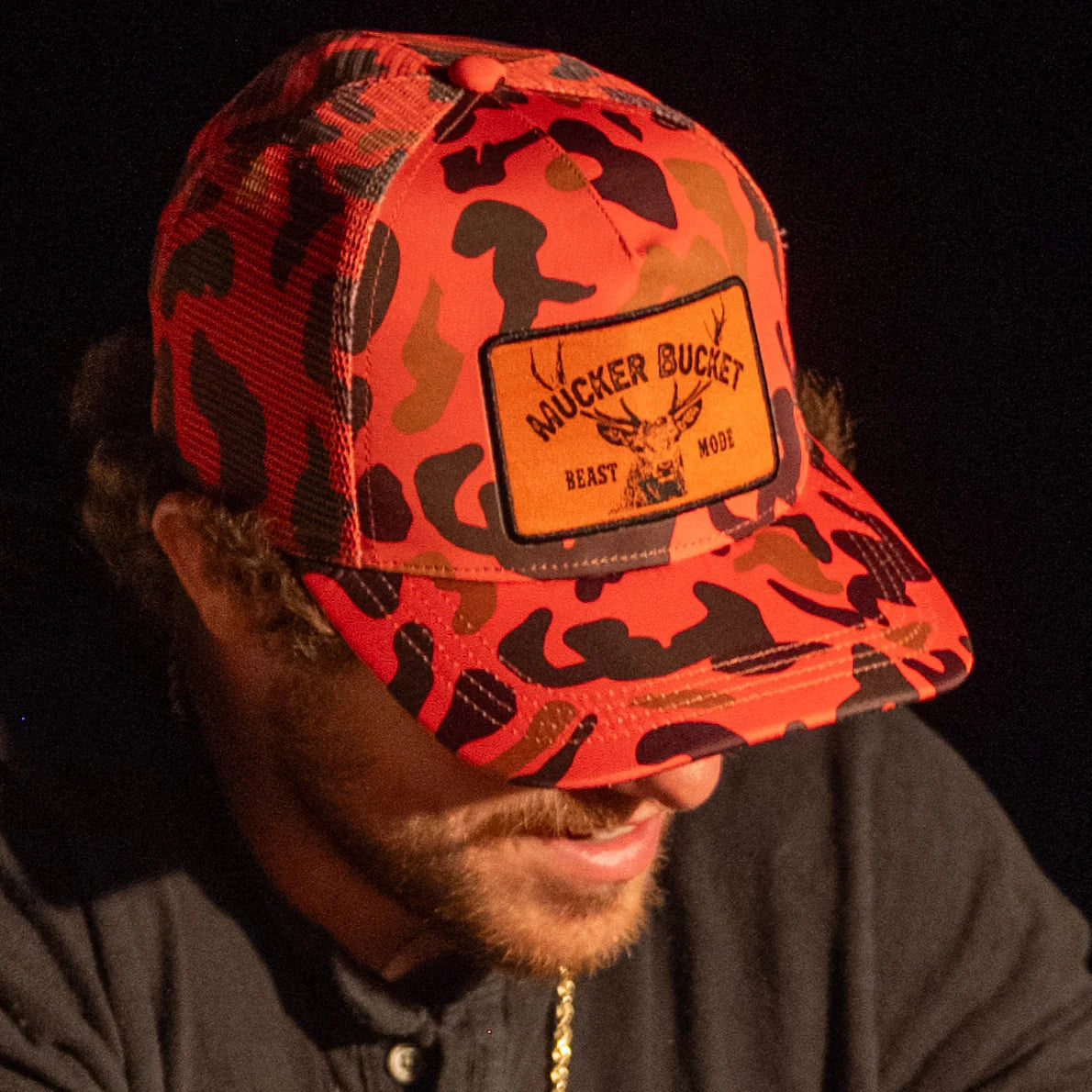 mucker bucket - "beast mode" orange camouflage trucker hat