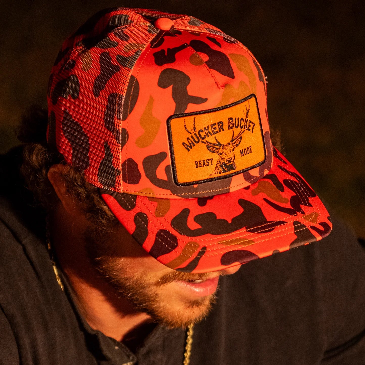 mucker bucket - "beast mode" orange camo trucker hat side