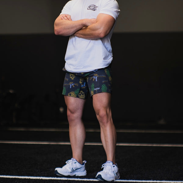 tango charlie - men's performance training shorts tropic thunder on model