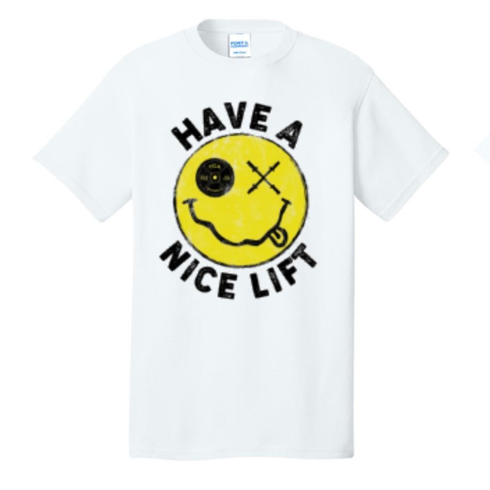 The “Thank You, have a Nice Lift" tee by Tango Charlie Apparel features a yellow smiley face with one X eye and tongue out, plus “HAVE A NICE LIFT” in black text. Made from a comfy cotton-poly blend for all-day wear.