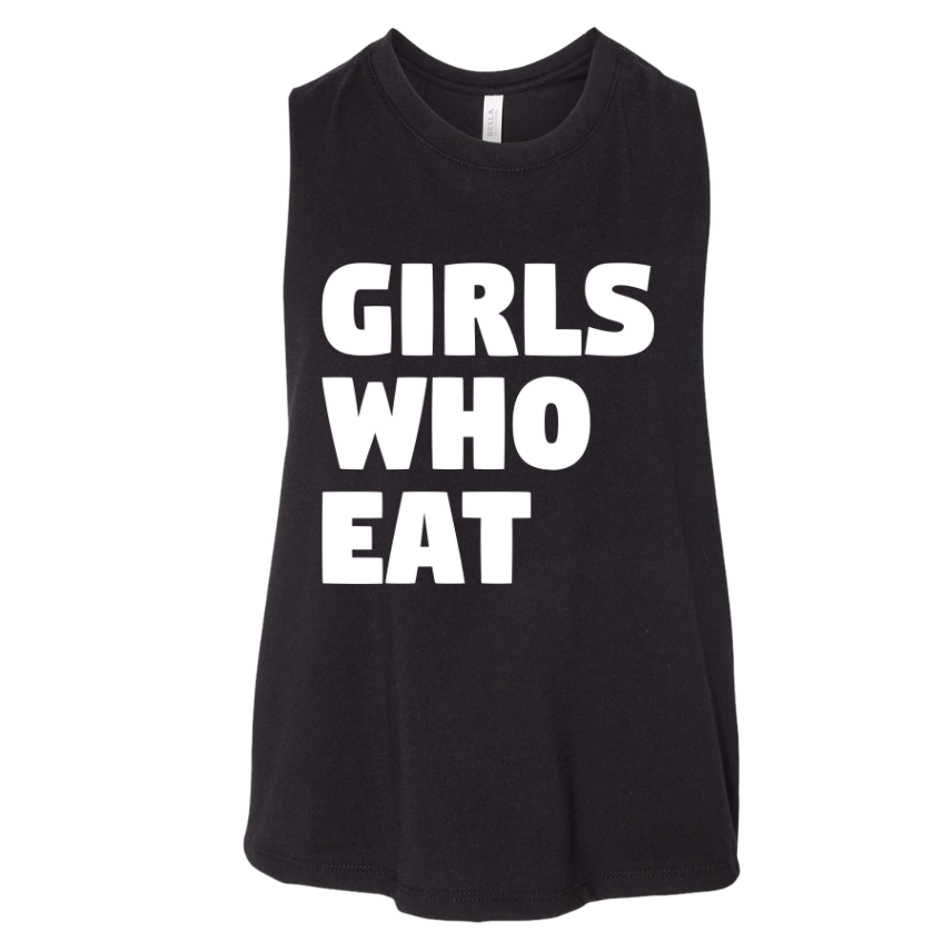 The Girls Who Eat Crop Tank by Tango Charlie Apparel is a comfy black sleeveless top with bold white “GIRLS WHO EAT” text—perfect inspirational gym wear.