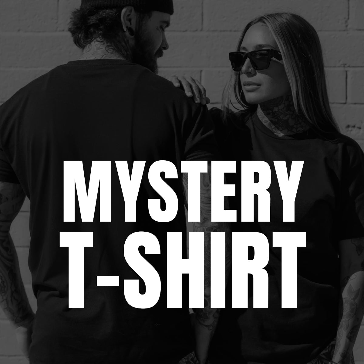A man and a woman in black tees stand side by side by a brick wall. Bold text says: Born United Private Label Mystery Tee—$10 each, final sale.