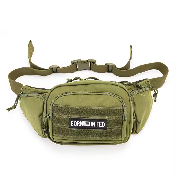 The OD Green Tac-Fanny-Pac by Born United Private Label is a tactical waist bag with multiple compartments, side zippers, and an adjustable strap with buckle. It includes a BORN UNITED patch on the front pocket.