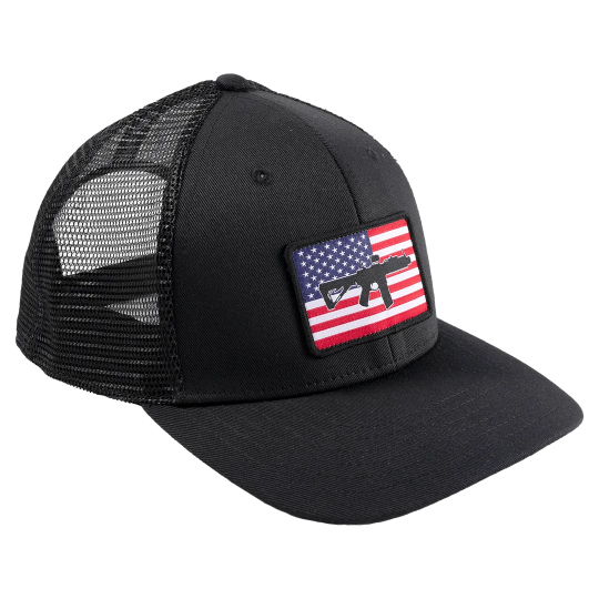 The AR Flag Hat by Black Rifle Coffee is a black mesh trucker cap with a front patch displaying an American flag background and a black rifle silhouette.