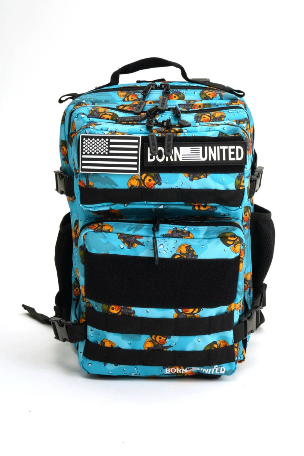 Tactiquack Tac-Pac - 25L tactical backpack in a bright blue print featuring a pattern of rubber ducks wearing military gear, with black webbing straps and a US flag morale patch on the front.