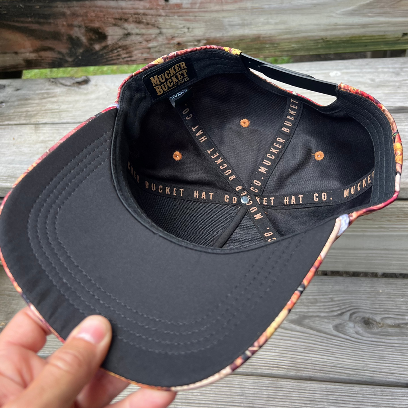 mucker bucket - chasin' tail fall camo curved brim hat