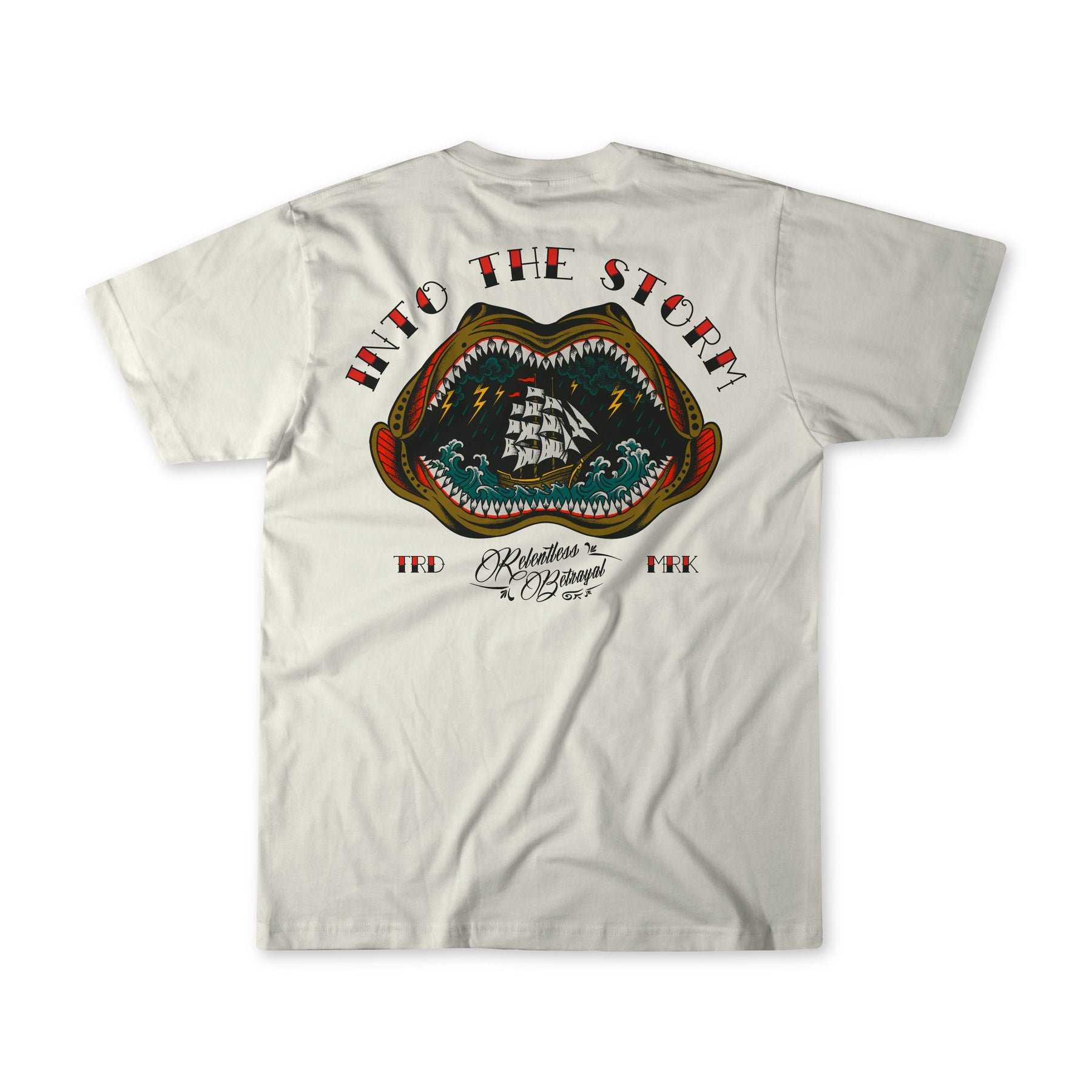 The Into the Storm Premium Ivory T-Shirt by Relentless Betrayal features premium jersey cotton and a ship-in-creature graphic with INTO THE STORM on top and Restless Rugged, TFD, and FRK below in stylized fonts.