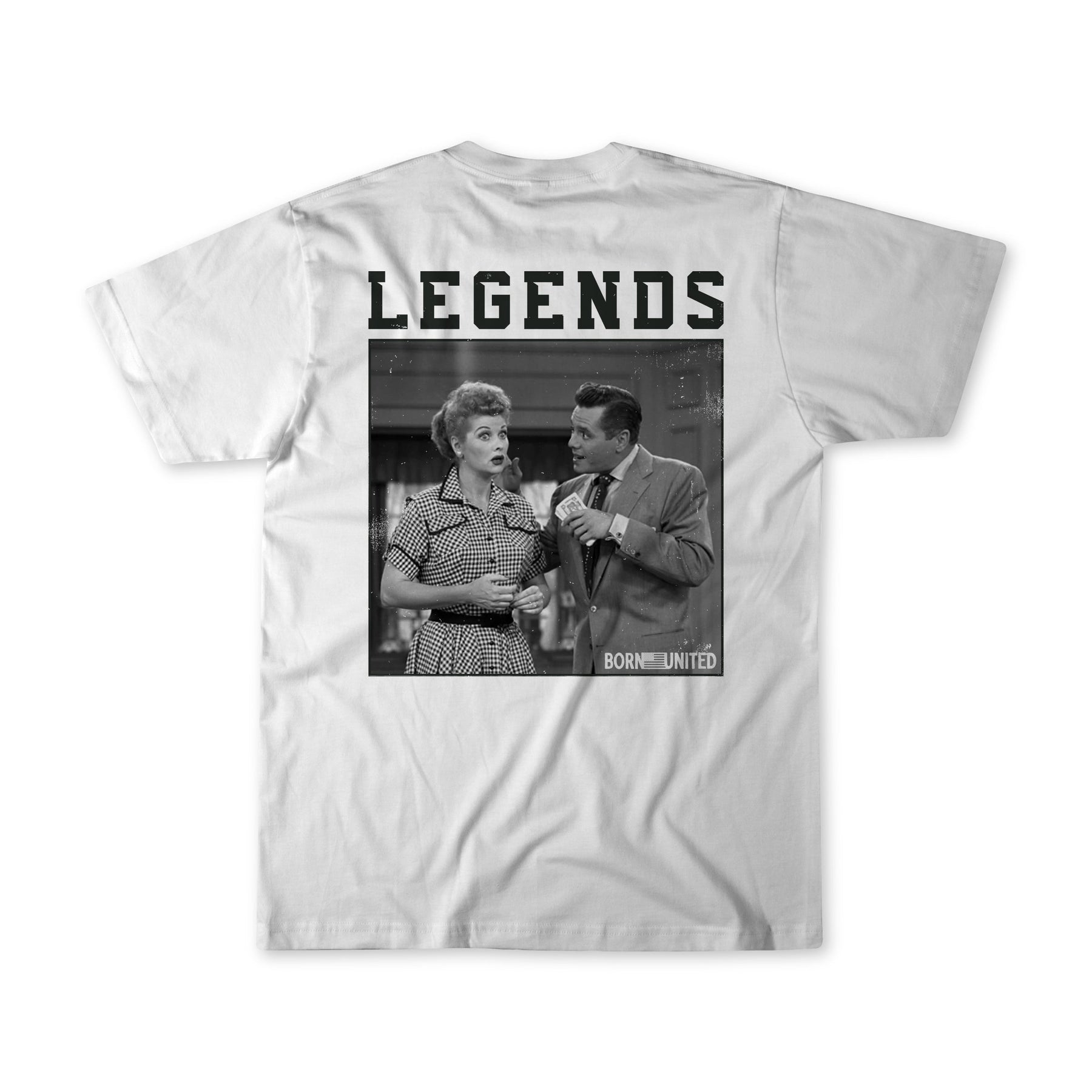 The Born United Private Label Legends - Honey Im Home! T-shirt features a black-and-white photo of a surprised woman and a man talking, with LEGENDS in bold above and BORN UNITED printed in the corner.