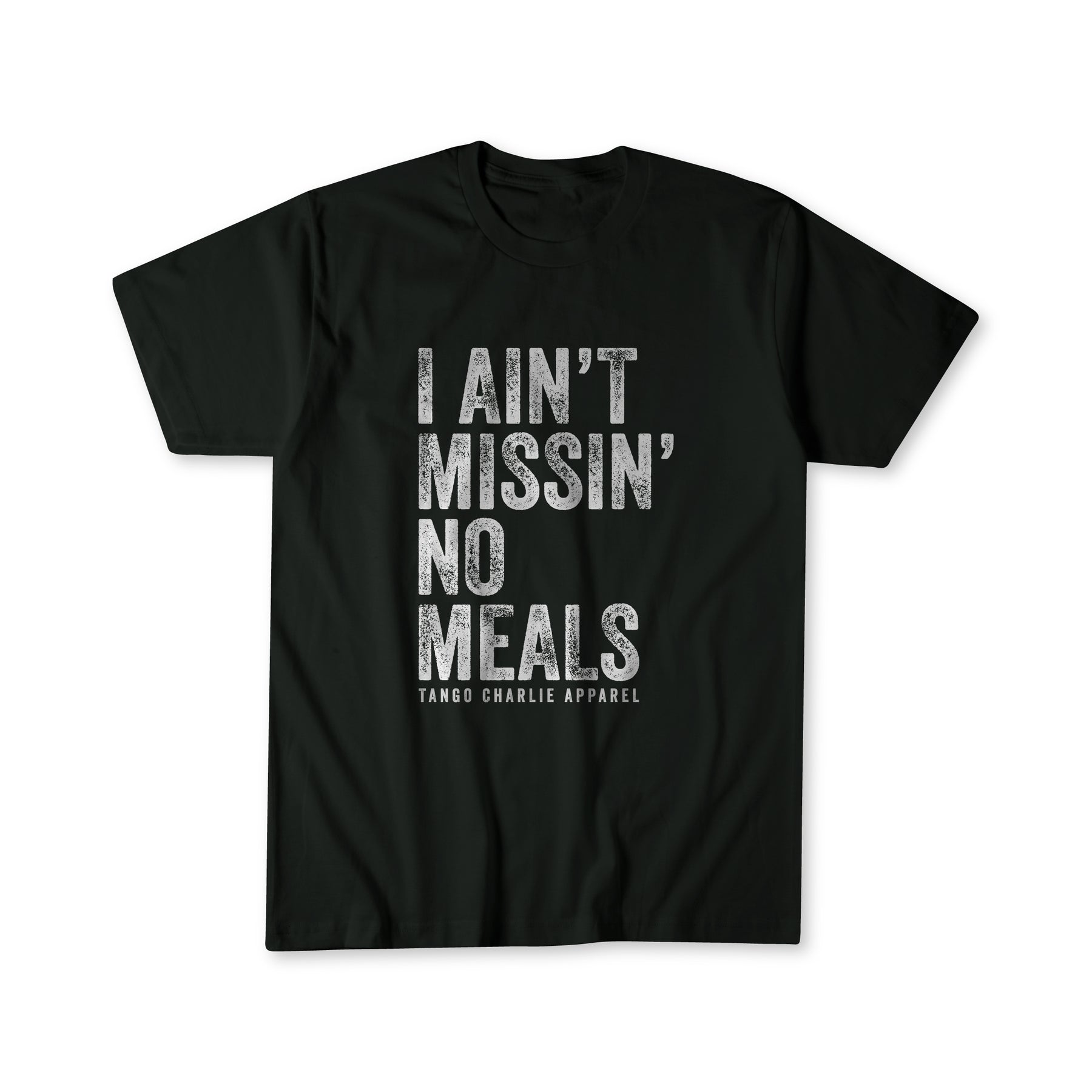 The I Ain’t Missin’ No Meals Tee by Tango Charlie Apparel features bold white text on a black cotton-poly blend, delivering all-day comfort in a stylish, everyday ComfyAF shirt.