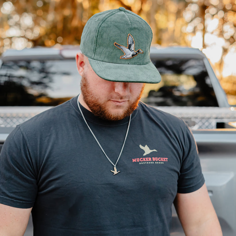 mucker bucket - trucks, ducks & bucks premium tee front on men's model