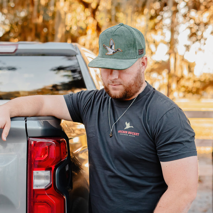 mucker bucket - trucks, ducks & bucks premium tee front on model