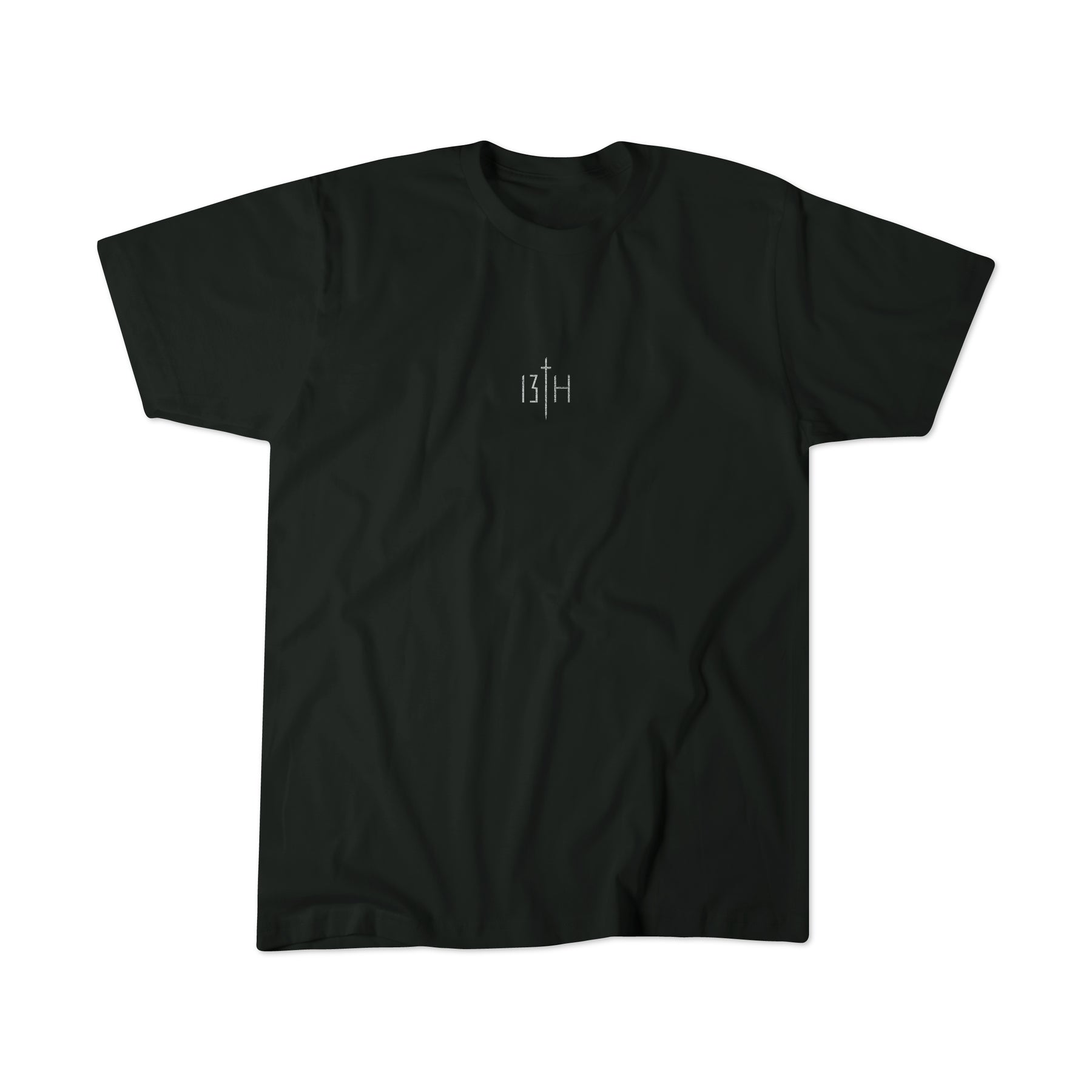 The Overcome Premium Tee by 13th is a black T-shirt with a minimalist design, showcasing a central white 13H logo. The fabric is soft and slightly wrinkled, symbolizing youthful strength to overcome challenges and embrace faith.