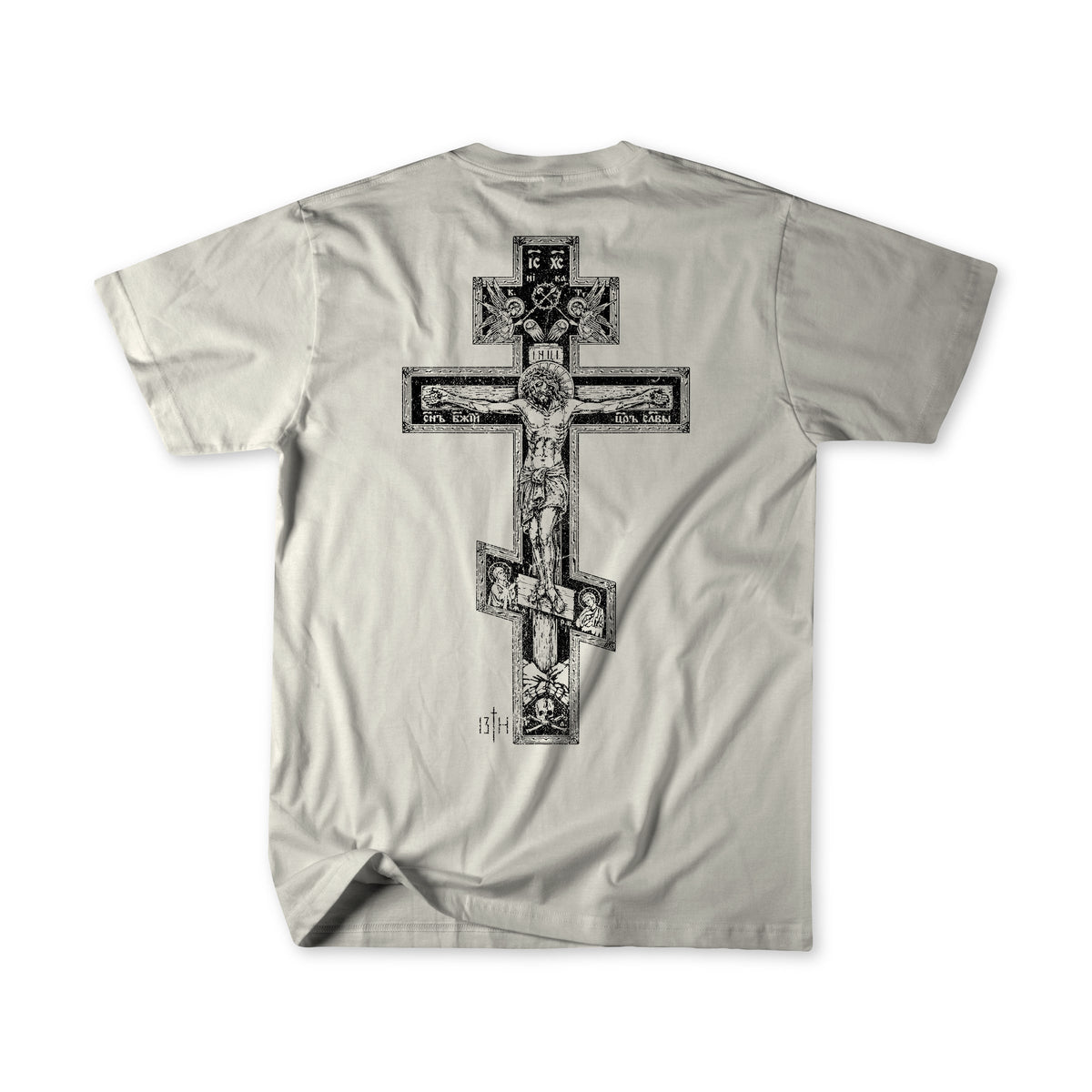A light gray short-sleeve t-shirt shown from the back, featuring a large black and gray ornate cross graphic with religious illustrations.