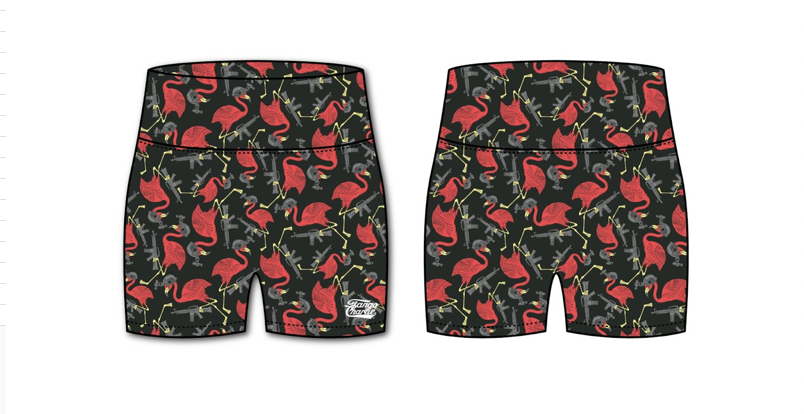 Tango Charlie Apparels Tactimingo womens high-waisted seamless front compression training shorts showcase a vibrant dinosaur pattern with red and green dinosaurs. Made from breathable fabric, they feature a small white logo near the bottom hem.