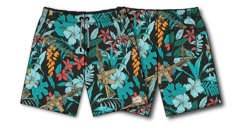 The Mens Performance Training Shorts by Tango Charlie Apparel feature a 5.5 Tactical Tropic design with red, orange, and blue tropical flowers and green leaves on a dark background, seamlessly integrating rifle images for versatile performance training.