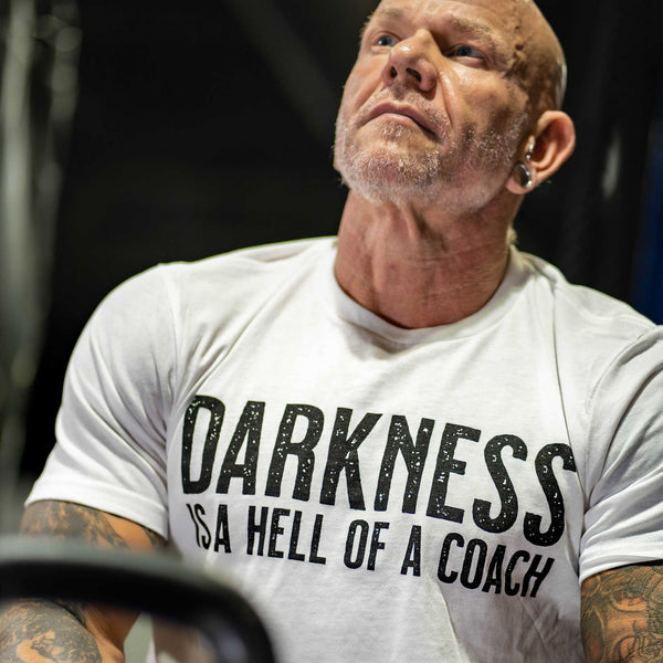 tango charlie - darkness is a hell of a coach t-shirt white on model
