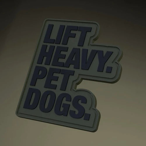 The Lift Heavy, Pet Dogs Patch by Tango Charlie Apparel is a PVC patch featuring bold text on a light background, equipped with a hook and loop backing for easy attachment.