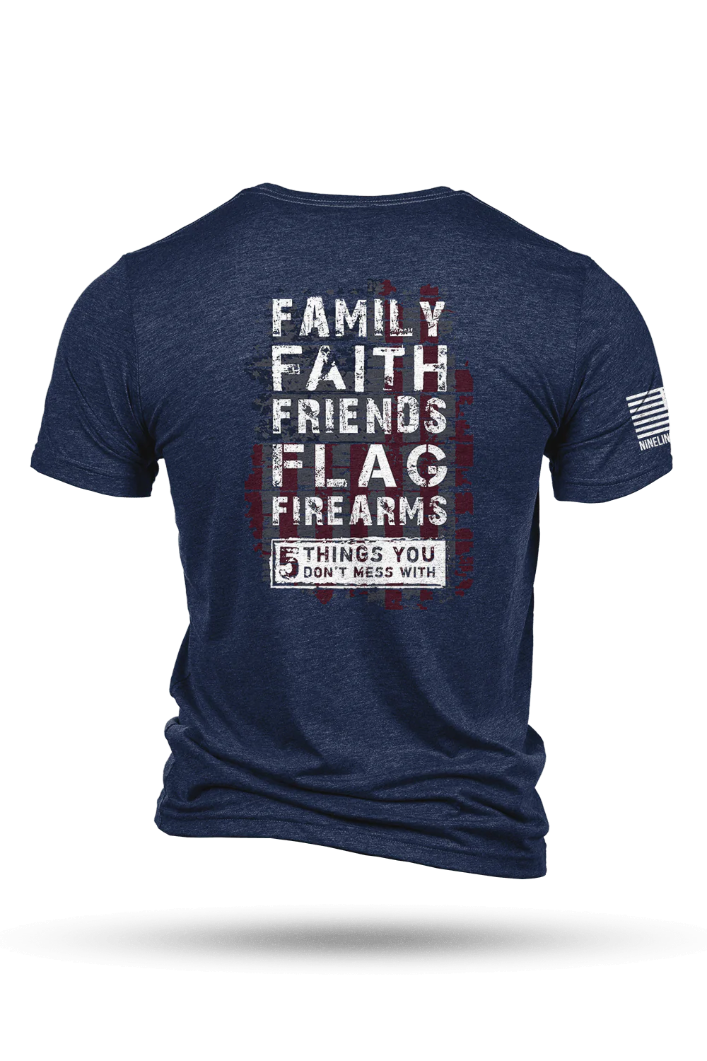 The back of the Navy Tri-Blend T-shirt by Nine Line Apparel features bold white and red text saying Family, Faith, Friends, Flag, Firearms and 5 Things You Dont Mess With, with an American flag graphic on the sleeve.