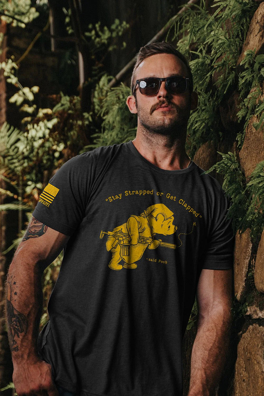 Nine Line's Stay Strapped or get clapped t-shirt on model