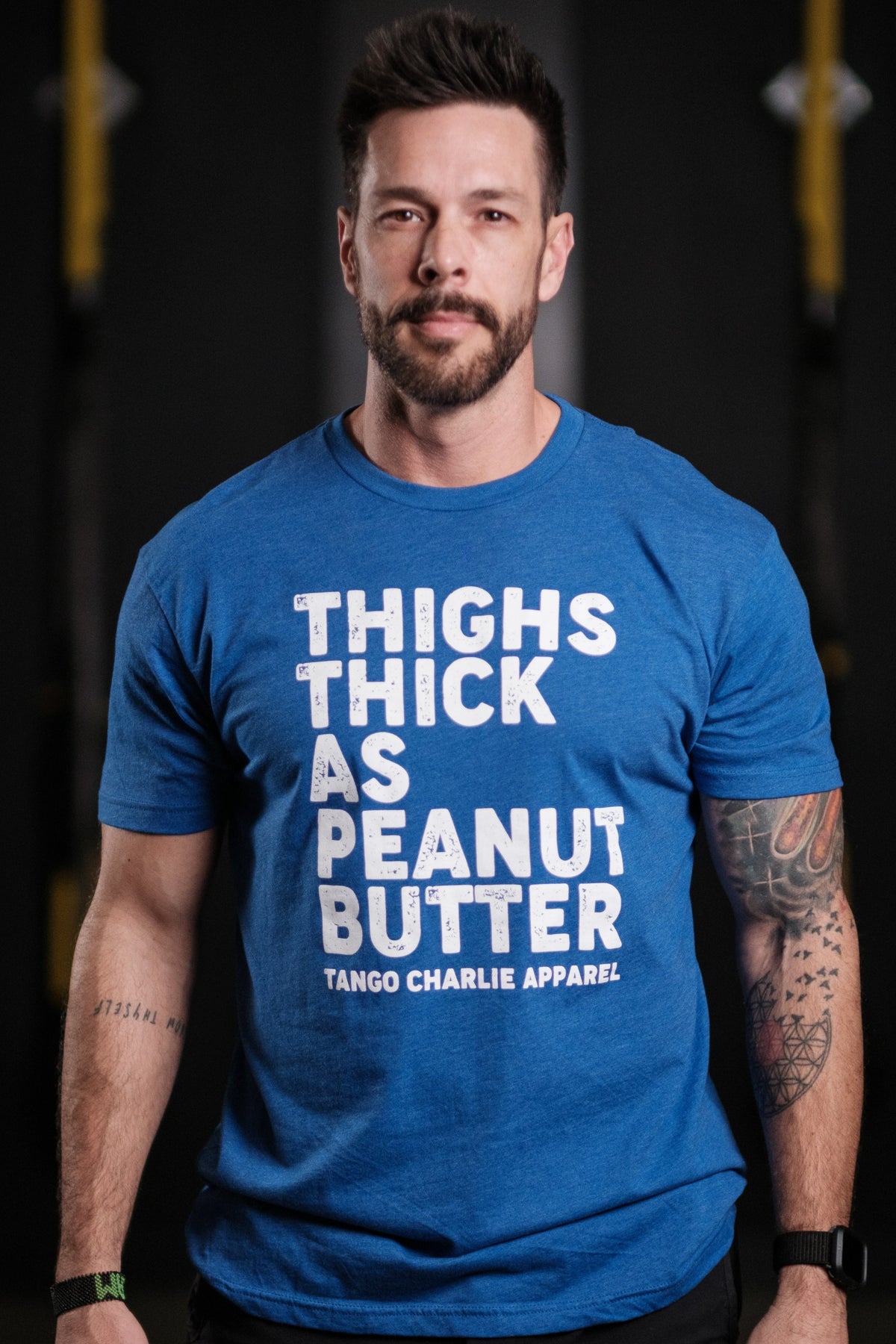 tango charlie - thighs thick as peanut butter t-shirt on model