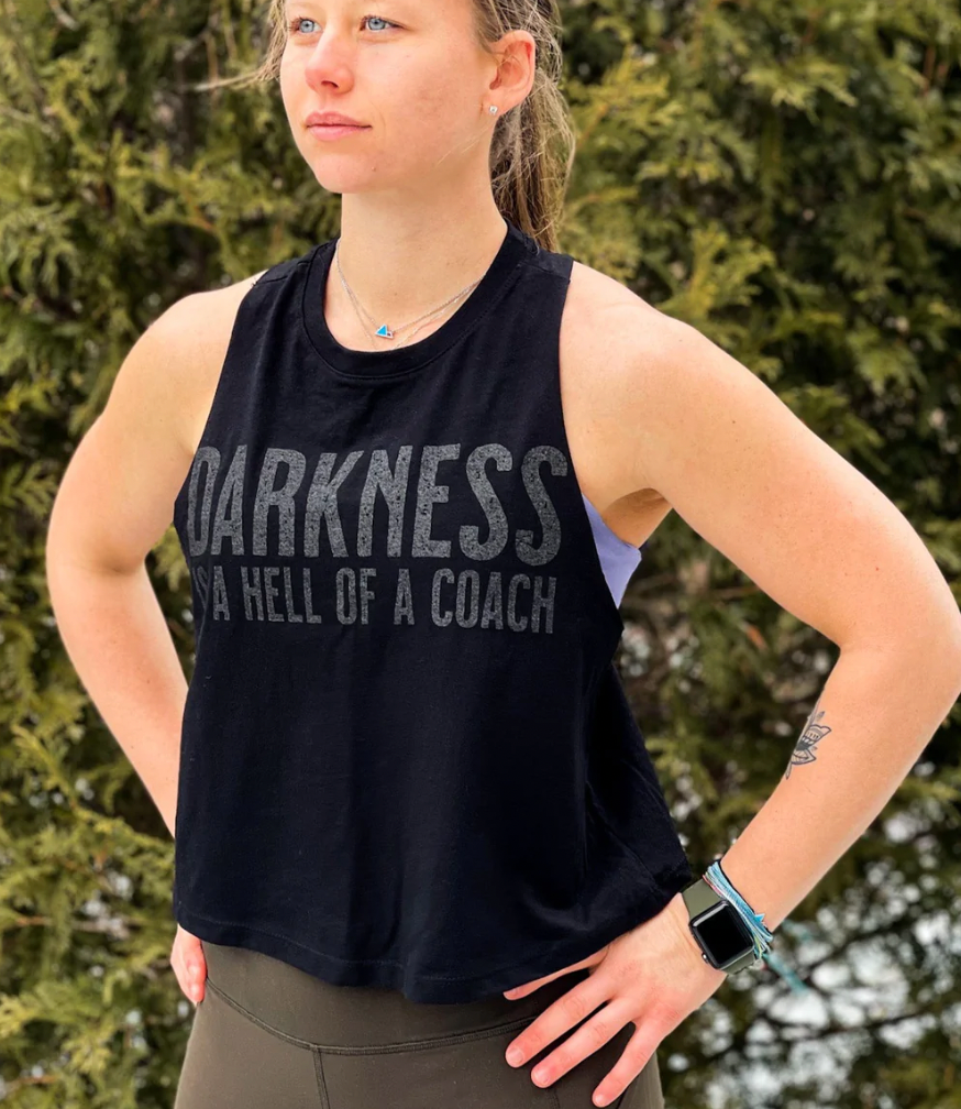 Darkness Is A Hell Of A Coach Cropped Tank