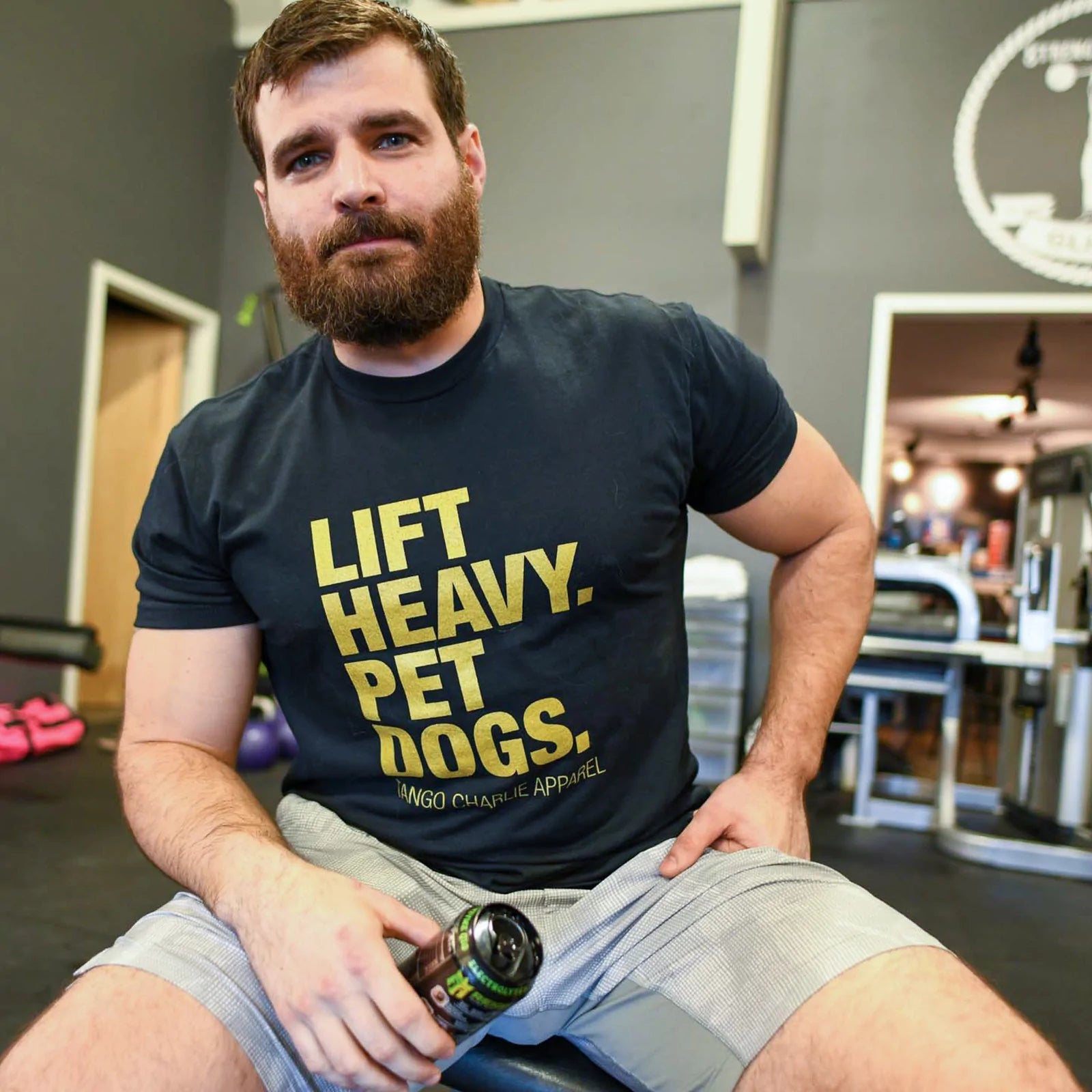 tango charlie - lift heavy pet dogs gold edition tee shirt on male model