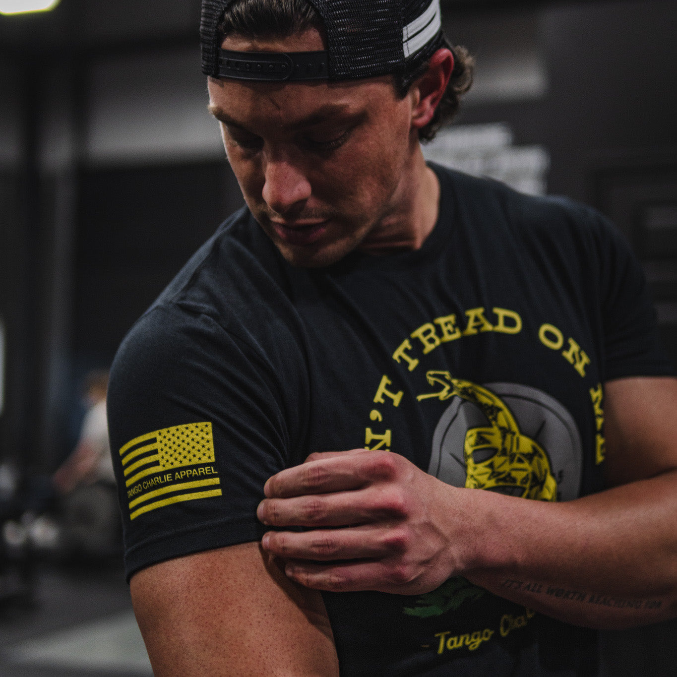 tango charlie - don't tread on me tee shirt on male model