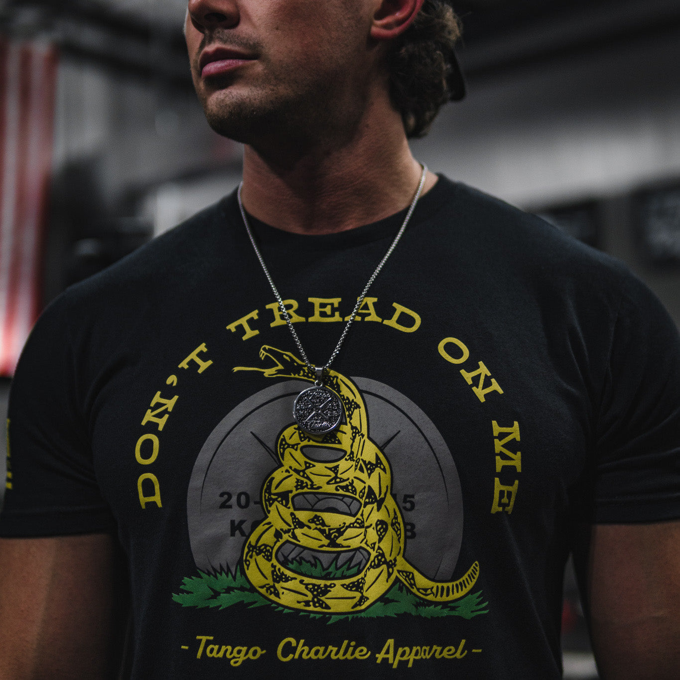 tango charlie - gadsden flag t-shirt on male model