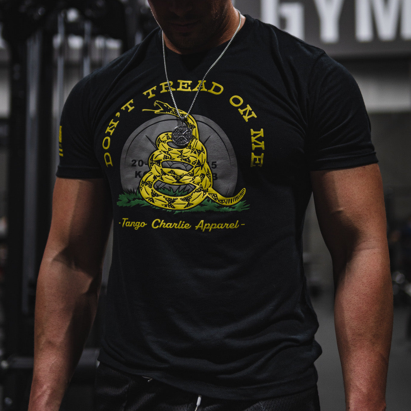 tango charlie - don't tread on me t-shirt on male model