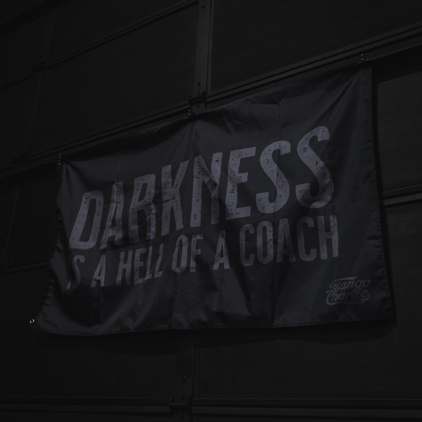 tango charlie - darkness is a hell of a coach flag